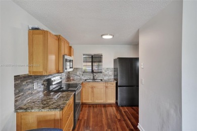Charming Townhouse Style Condo in the Heart of Kendale Lakes! on Miccosukee Golf and Country Club in Florida - for sale on GolfHomes.com, golf home, golf lot
