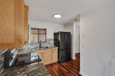 Charming Townhouse Style Condo in the Heart of Kendale Lakes! on Miccosukee Golf and Country Club in Florida - for sale on GolfHomes.com, golf home, golf lot