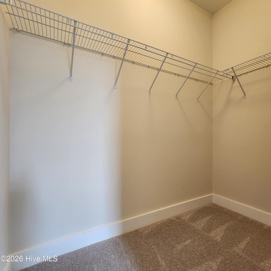 Have you been searching for a coastal cottage with clean lines on The Carolina Club in North Carolina - for sale on GolfHomes.com, golf home, golf lot