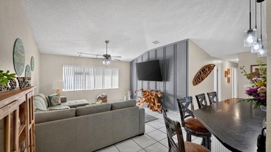 Under contract-accepting backup offers. BRAND NEW ROOF! on The Grand Club - Pine Lakes Course in Florida - for sale on GolfHomes.com, golf home, golf lot