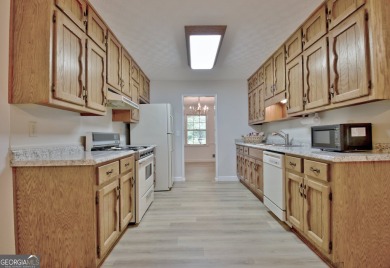 From the moment you walk into this home you know it has been on Canongate At Flat Creek Club in Georgia - for sale on GolfHomes.com, golf home, golf lot