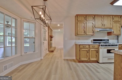 From the moment you walk into this home you know it has been on Canongate At Flat Creek Club in Georgia - for sale on GolfHomes.com, golf home, golf lot