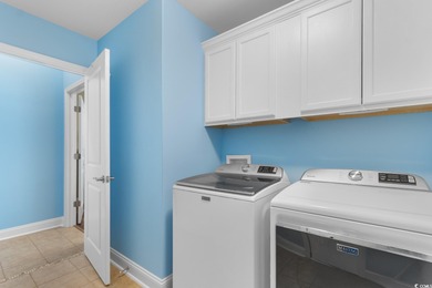 Experience the pinnacle of coastal luxury in this elegantly on Barefoot Resort and Golf Club  in South Carolina - for sale on GolfHomes.com, golf home, golf lot