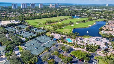 This exquisite residence boasts breathtaking views of the golf on The Colony Golf and Country Club in Florida - for sale on GolfHomes.com, golf home, golf lot