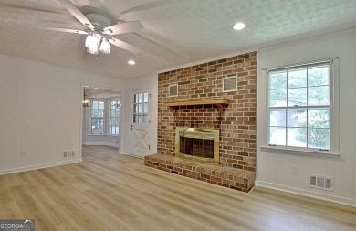 From the moment you walk into this home you know it has been on Canongate At Flat Creek Club in Georgia - for sale on GolfHomes.com, golf home, golf lot