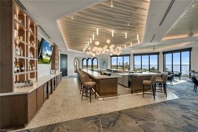 This exquisite residence boasts breathtaking views of the golf on The Colony Golf and Country Club in Florida - for sale on GolfHomes.com, golf home, golf lot