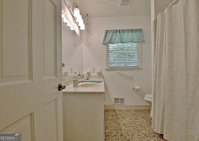 From the moment you walk into this home you know it has been on Canongate At Flat Creek Club in Georgia - for sale on GolfHomes.com, golf home, golf lot