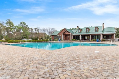 Experience the pinnacle of coastal luxury in this elegantly on Barefoot Resort and Golf Club  in South Carolina - for sale on GolfHomes.com, golf home, golf lot