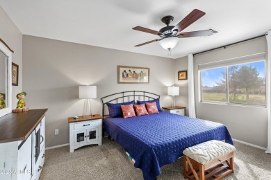 This stunning 5-bed, 2.5-bath home in Augusta Ranch backs to the on Augusta Ranch Golf Club in Arizona - for sale on GolfHomes.com, golf home, golf lot
