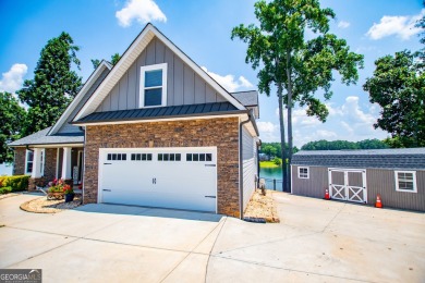 Stunning Lakefront Retreat with 225+ Feet of Shoreline  Welcome on Fairfield Plantation Golf and Country Club in Georgia - for sale on GolfHomes.com, golf home, golf lot