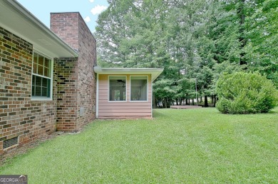From the moment you walk into this home you know it has been on Canongate At Flat Creek Club in Georgia - for sale on GolfHomes.com, golf home, golf lot