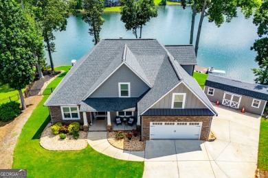 Stunning Lakefront Retreat with 225+ Feet of Shoreline  Welcome on Fairfield Plantation Golf and Country Club in Georgia - for sale on GolfHomes.com, golf home, golf lot
