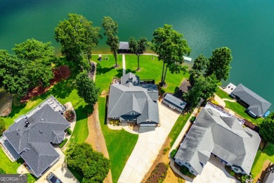 Stunning Lakefront Retreat with 225+ Feet of Shoreline  Welcome on Fairfield Plantation Golf and Country Club in Georgia - for sale on GolfHomes.com, golf home, golf lot