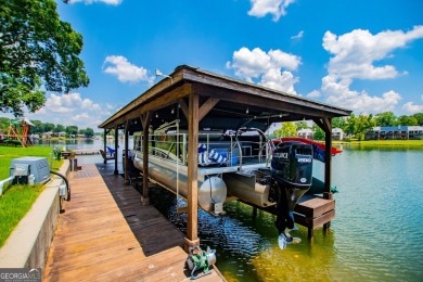 Stunning Lakefront Retreat with 225+ Feet of Shoreline  Welcome on Fairfield Plantation Golf and Country Club in Georgia - for sale on GolfHomes.com, golf home, golf lot