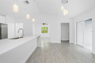 Fully Renovated Pool Home - No HOA, No Flood Insurance Required on Lemon Bay Golf Club in Florida - for sale on GolfHomes.com, golf home, golf lot