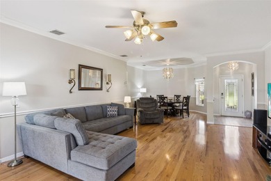 Enjoy easy access to a year-round heated swimming pool without on Stonegate Golf Club in Florida - for sale on GolfHomes.com, golf home, golf lot