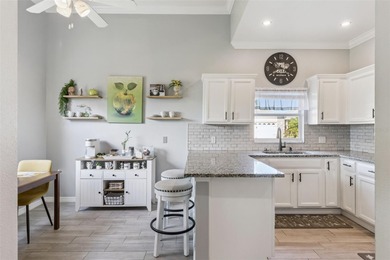 Enjoy easy access to a year-round heated swimming pool without on Stonegate Golf Club in Florida - for sale on GolfHomes.com, golf home, golf lot