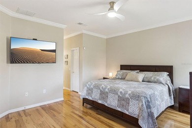 Enjoy easy access to a year-round heated swimming pool without on Stonegate Golf Club in Florida - for sale on GolfHomes.com, golf home, golf lot