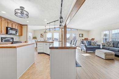 Just a short walk to the Atlantic ocean, this spacious raised on Tupelo Bay Golf Complex  in South Carolina - for sale on GolfHomes.com, golf home, golf lot