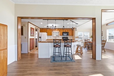 Just a short walk to the Atlantic ocean, this spacious raised on Tupelo Bay Golf Complex  in South Carolina - for sale on GolfHomes.com, golf home, golf lot