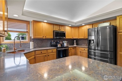 Cute as can be and packed with perks! This 3 bed, 3 bath ranch on Mad Russian Golf Course in Colorado - for sale on GolfHomes.com, golf home, golf lot