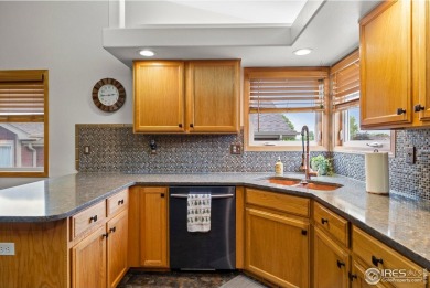 Cute as can be and packed with perks! This 3 bed, 3 bath ranch on Mad Russian Golf Course in Colorado - for sale on GolfHomes.com, golf home, golf lot