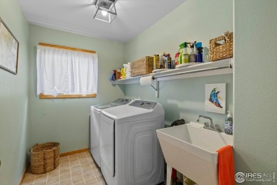 Cute as can be and packed with perks! This 3 bed, 3 bath ranch on Mad Russian Golf Course in Colorado - for sale on GolfHomes.com, golf home, golf lot
