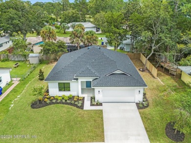 STUNNING NEW CONSTRUCTION IN SAINT AUGUSTINE SHORES GOLF on St. Augustine Shores Golf Club in Florida - for sale on GolfHomes.com, golf home, golf lot