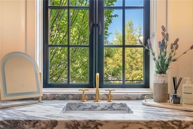 THIS IS AN ABSOLUTE SHOW STOPPER LOCATED IN THE SOUGHT AFTER on Polo Golf and Country Club in Georgia - for sale on GolfHomes.com, golf home, golf lot