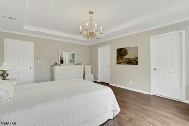With three levels of luxury space, this Belmont model  is on Morris County Golf Club in New Jersey - for sale on GolfHomes.com, golf home, golf lot