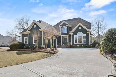Nestled on a quiet cul-de-sac, this property offers stunning on River Landing Golf Course in North Carolina - for sale on GolfHomes.com, golf home, golf lot