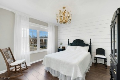 With three levels of luxury space, this Belmont model  is on Morris County Golf Club in New Jersey - for sale on GolfHomes.com, golf home, golf lot