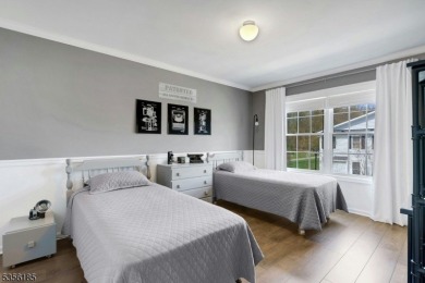 With three levels of luxury space, this Belmont model  is on Morris County Golf Club in New Jersey - for sale on GolfHomes.com, golf home, golf lot