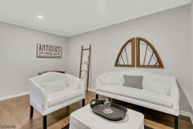 With three levels of luxury space, this Belmont model  is on Morris County Golf Club in New Jersey - for sale on GolfHomes.com, golf home, golf lot