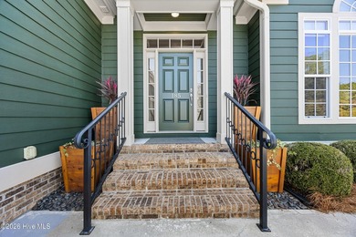 Nestled on a quiet cul-de-sac, this property offers stunning on River Landing Golf Course in North Carolina - for sale on GolfHomes.com, golf home, golf lot