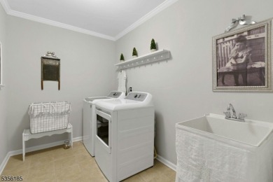 With three levels of luxury space, this Belmont model  is on Morris County Golf Club in New Jersey - for sale on GolfHomes.com, golf home, golf lot