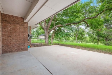 Welcome to this spacious home in the gated community of Pecan on Pecan Plantation Country Club in Texas - for sale on GolfHomes.com, golf home, golf lot