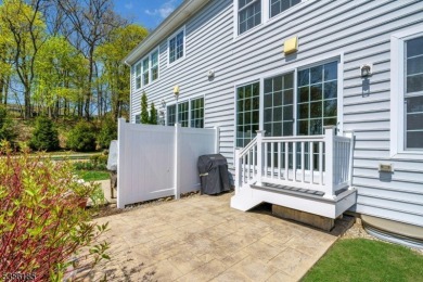 With three levels of luxury space, this Belmont model  is on Morris County Golf Club in New Jersey - for sale on GolfHomes.com, golf home, golf lot