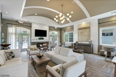With three levels of luxury space, this Belmont model  is on Morris County Golf Club in New Jersey - for sale on GolfHomes.com, golf home, golf lot