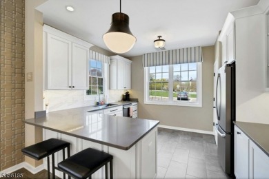 With three levels of luxury space, this Belmont model  is on Morris County Golf Club in New Jersey - for sale on GolfHomes.com, golf home, golf lot