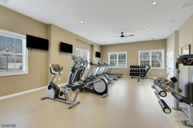 With three levels of luxury space, this Belmont model  is on Morris County Golf Club in New Jersey - for sale on GolfHomes.com, golf home, golf lot