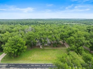 Welcome to this spacious home in the gated community of Pecan on Pecan Plantation Country Club in Texas - for sale on GolfHomes.com, golf home, golf lot