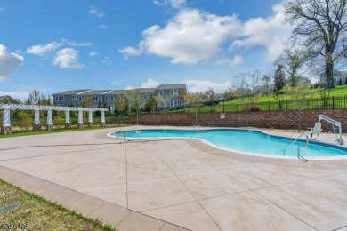 With three levels of luxury space, this Belmont model  is on Morris County Golf Club in New Jersey - for sale on GolfHomes.com, golf home, golf lot