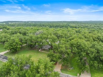 Welcome to this spacious home in the gated community of Pecan on Pecan Plantation Country Club in Texas - for sale on GolfHomes.com, golf home, golf lot