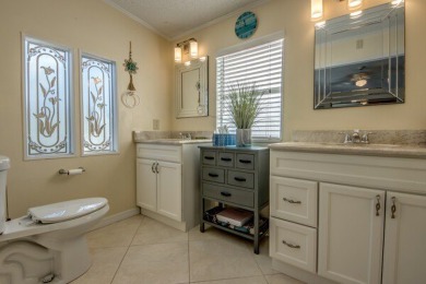 This stunning two-bedroom, two-bathroom home is ready for you to on Pine Lakes Country Club in Florida - for sale on GolfHomes.com, golf home, golf lot