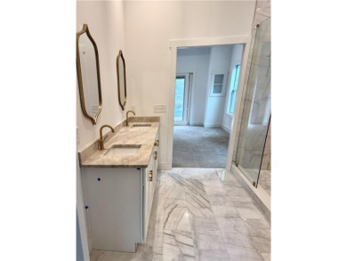 This stunning new construction blends luxury, functionality, and on The Highlands Course at Lake Arrowhead in Georgia - for sale on GolfHomes.com, golf home, golf lot