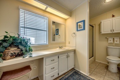 This stunning two-bedroom, two-bathroom home is ready for you to on Pine Lakes Country Club in Florida - for sale on GolfHomes.com, golf home, golf lot