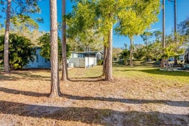 This stunning two-bedroom, two-bathroom home is ready for you to on Pine Lakes Country Club in Florida - for sale on GolfHomes.com, golf home, golf lot