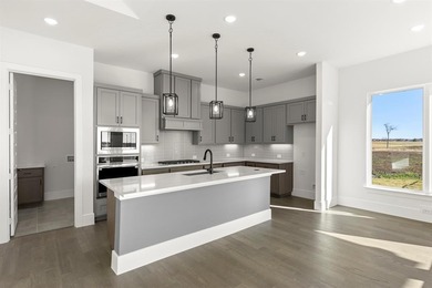 MLS# 21157968 - Built by Stonefield Homes - Ready Now! ~ on Heath Golf and Yacht Club in Texas - for sale on GolfHomes.com, golf home, golf lot