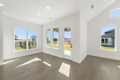 MLS# 21157968 - Built by Stonefield Homes - Ready Now! ~ on Heath Golf and Yacht Club in Texas - for sale on GolfHomes.com, golf home, golf lot